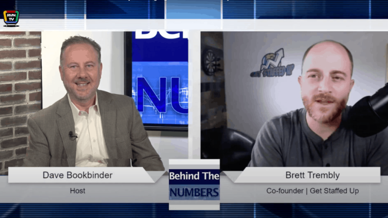 At the left is a logo that says RVN TV, and Behind the numbers at the bottom. As well a man smiling wearing a brown and white shirt and in the right we can see Brett Trembly with a grey shirt sitting near a microphone, at the office he is in there is a GSU logo in the white wall behind him. In the image shows as well the name of the host is Dave Bookbinder and Brett Trembly Co-founder- Get staffed up.